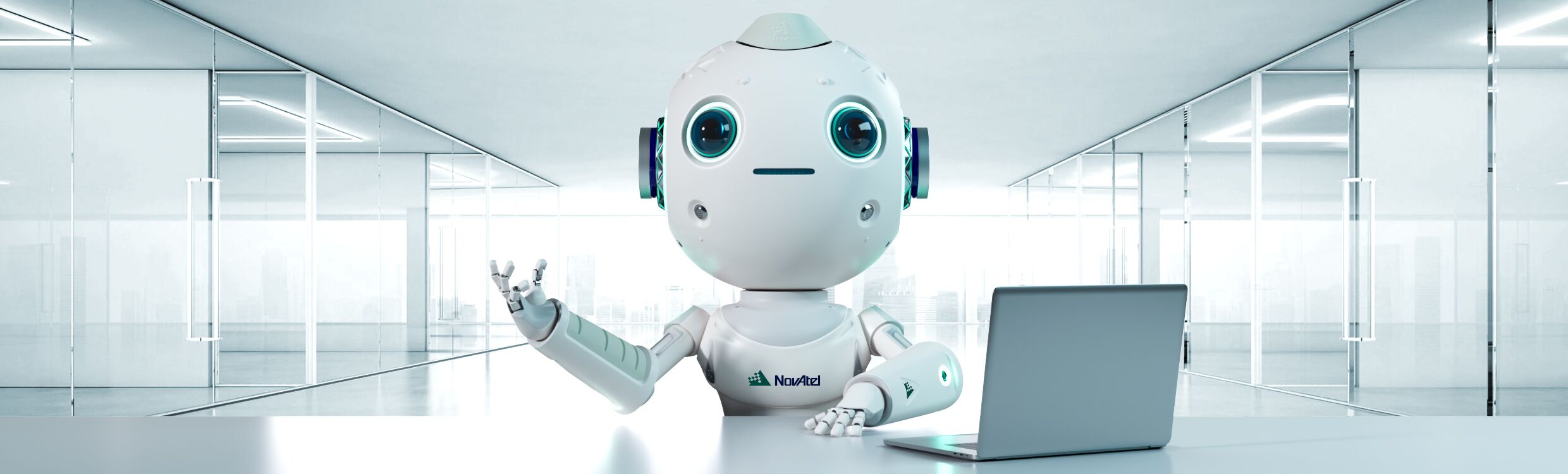 A NovAtel branded white robot with blue eyes named EDIE sitting at a desk with a laptop